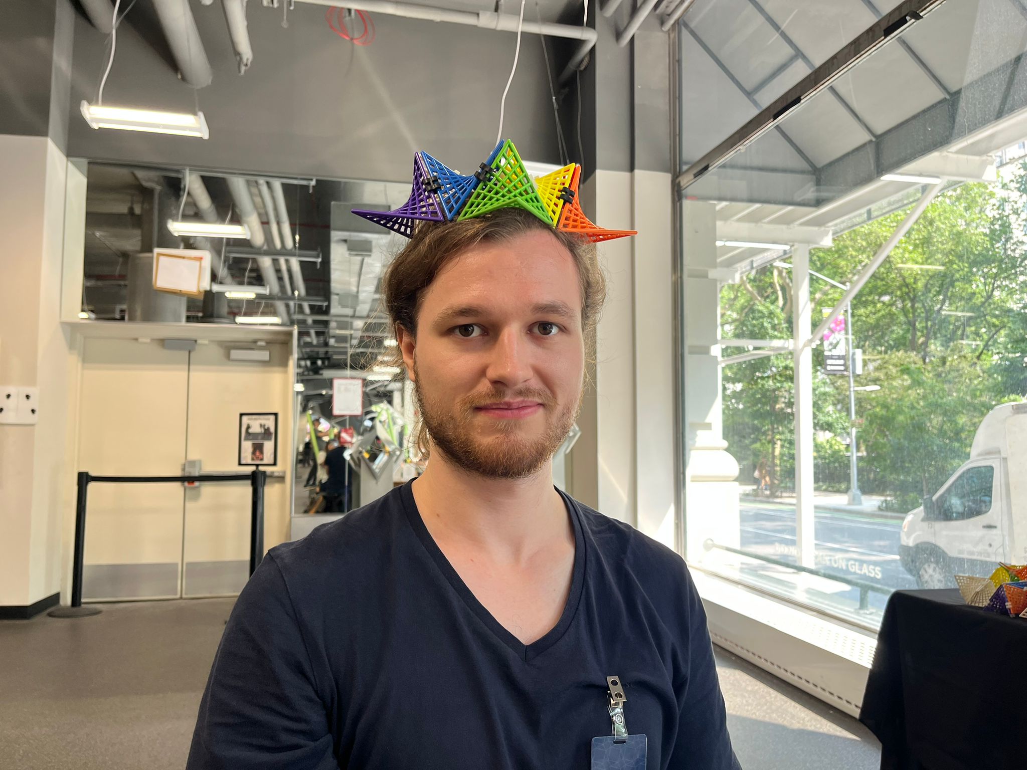 Me wearing a hat made out of hyperbolic paraboloid pieces